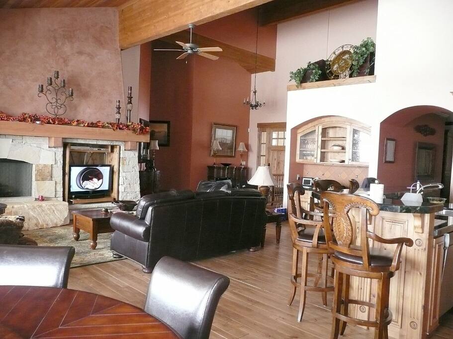 Main living room open to Gourmet kitchen with wonderful views of the mountains