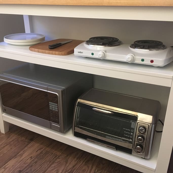 Dual burner, countertop oven and microwave.
