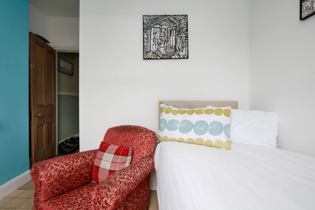 Bed and chair and door