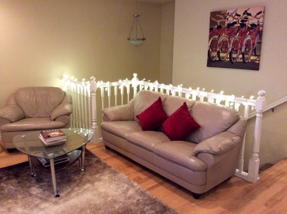 Sofa and chair in the upstairs living room.