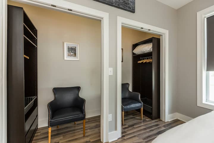 The master bedroom features his and her walk-in closets 