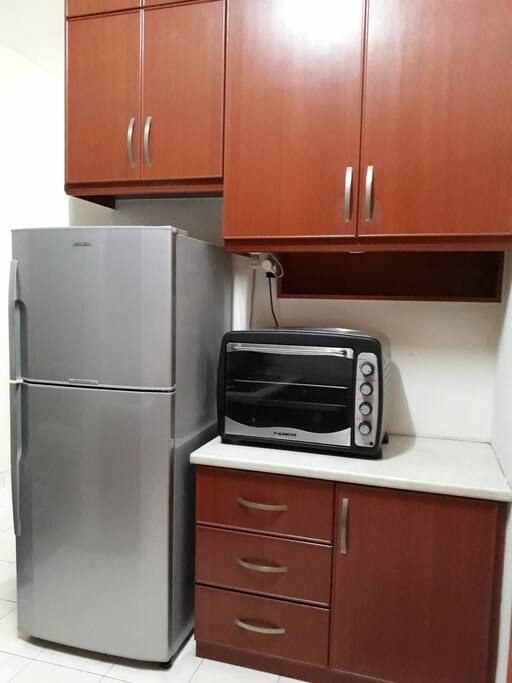 Kitchen with basic appliances for cooking