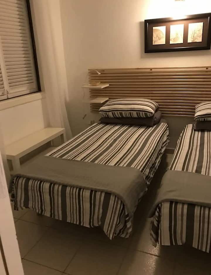 Twin beds with large built in wardrobe 