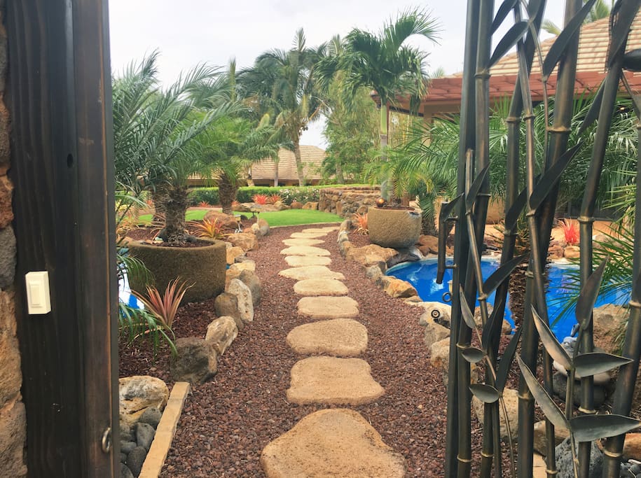 Tropical ponds surround your entry to Paradise Cabana.