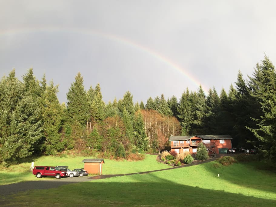 Our home at the end of the rainbow, tucked into the woods