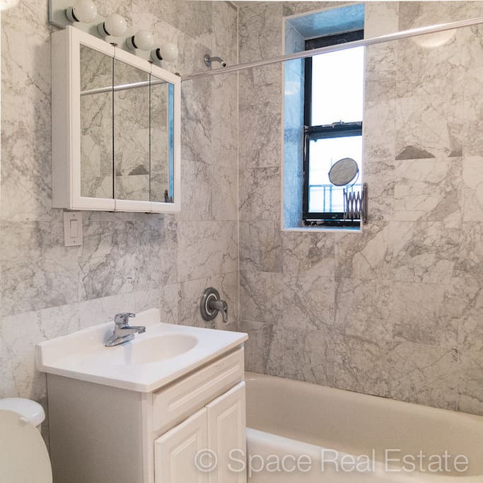 Bright and modern marble bathroom
