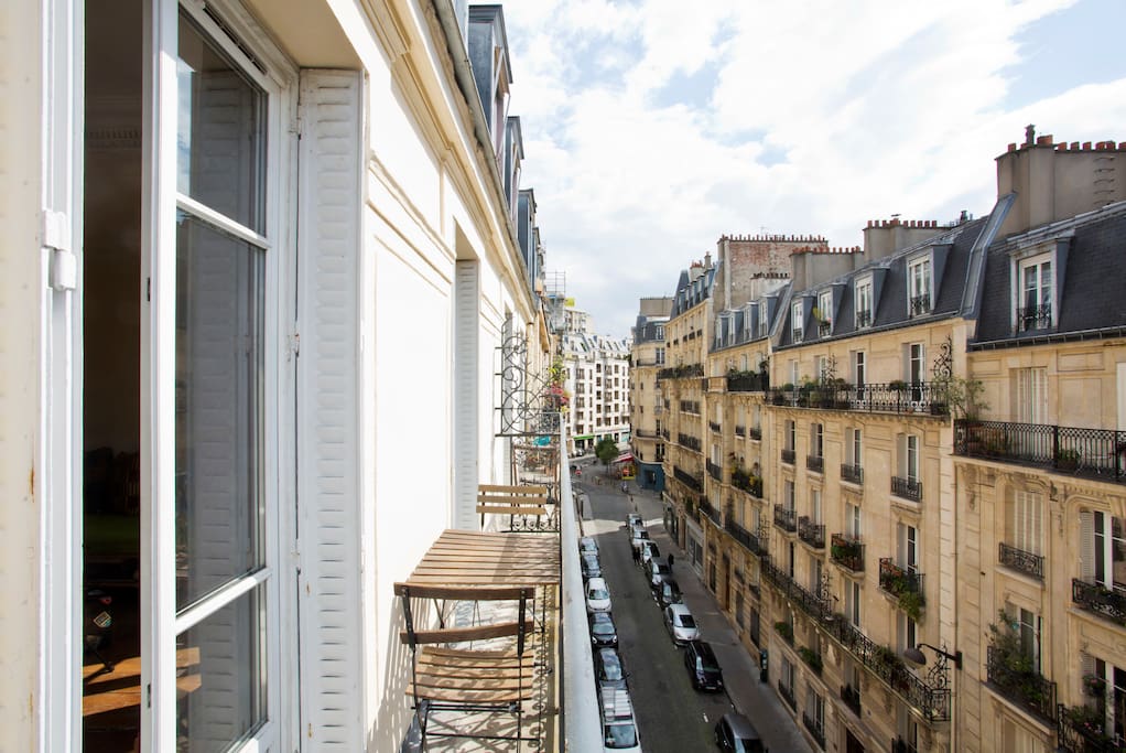 The balcony, with a tiny table. Ideal place for a sunny drink