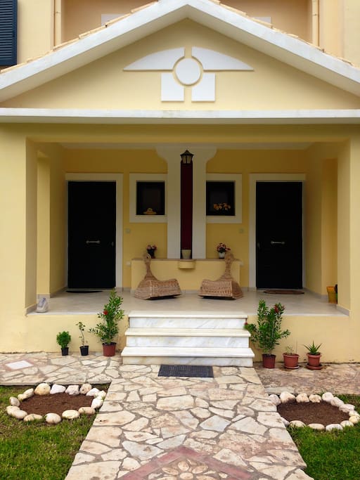 Front door (right). The house is part of a two-house building