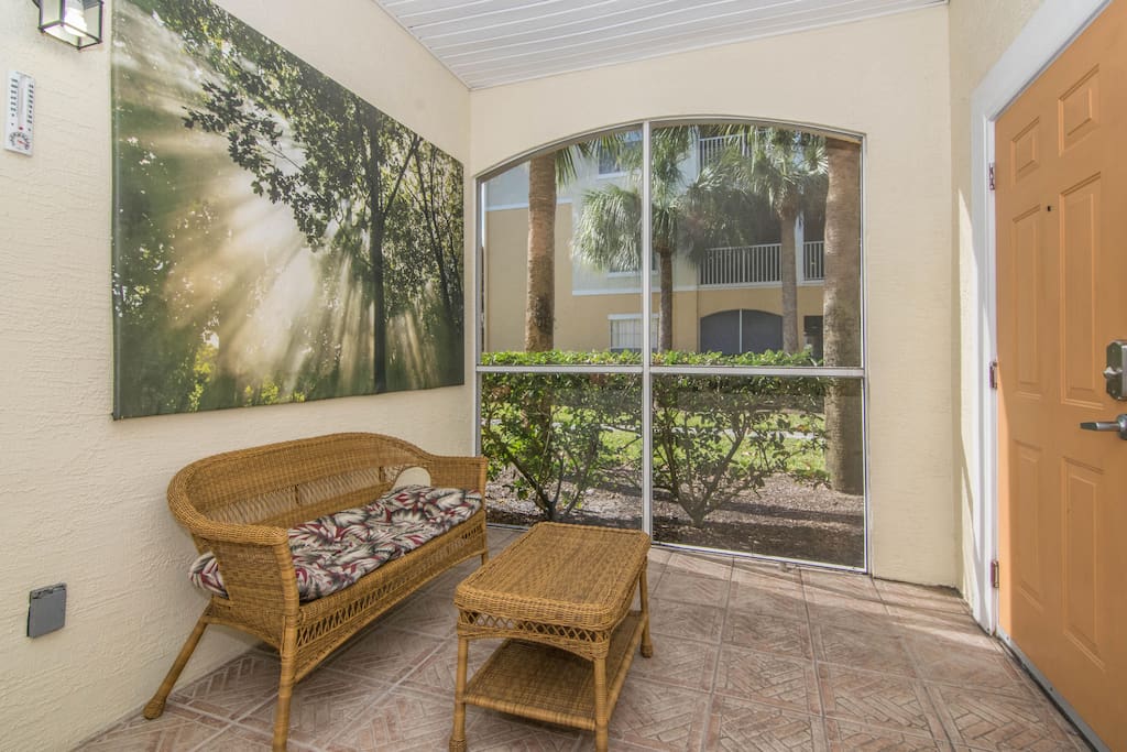 Entry into the screened porch before you enter inside