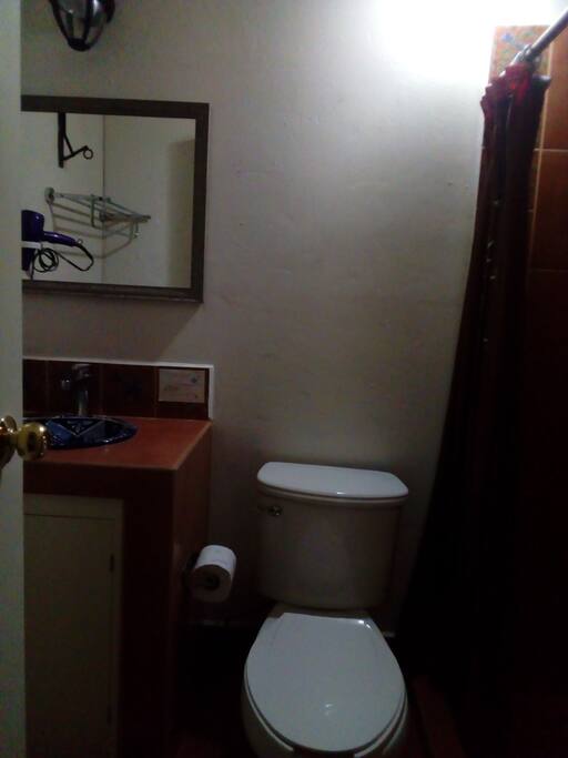 The bathroom is private and is perfect for a couple