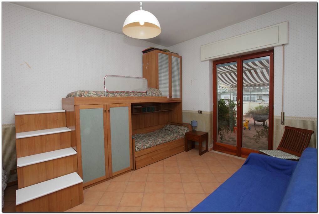 Camera con quattro posti letto
