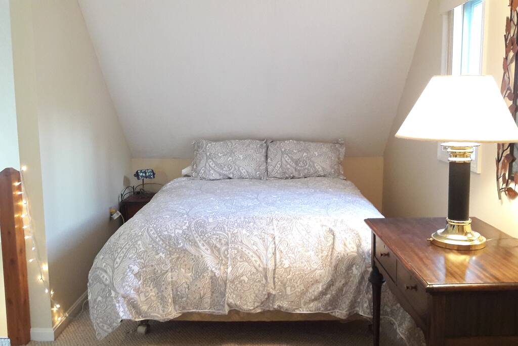 Loft bedroom with queen bed