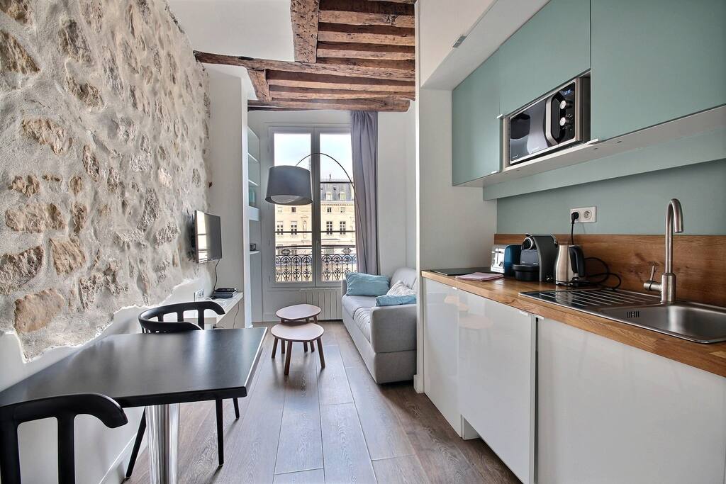 Living Room with dining area and kitchen