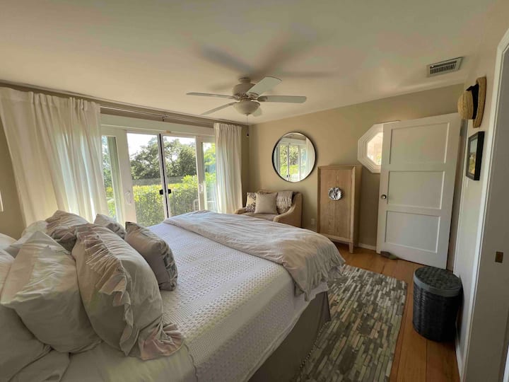 Bedroom #1 with king size bed, balcony and ensuite bathroom with shower/tub, Toto bidet toilet, marble walls and Mexican concrete floor tiles