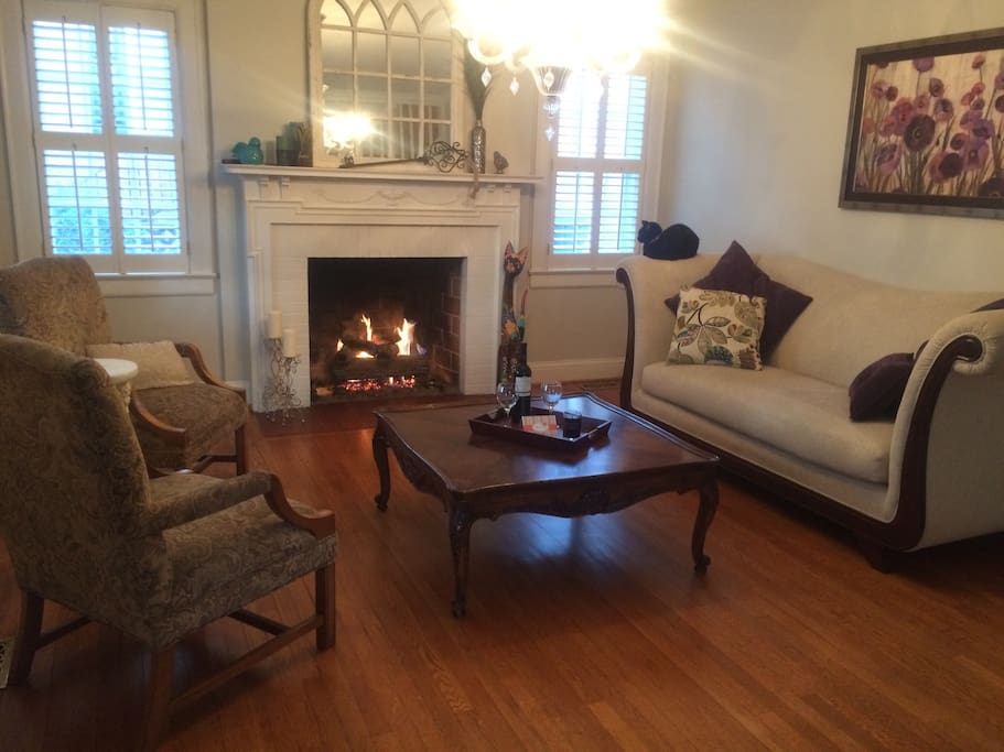 Parlor with gas fireplace, which you are welcome to use. The black cat is not included.