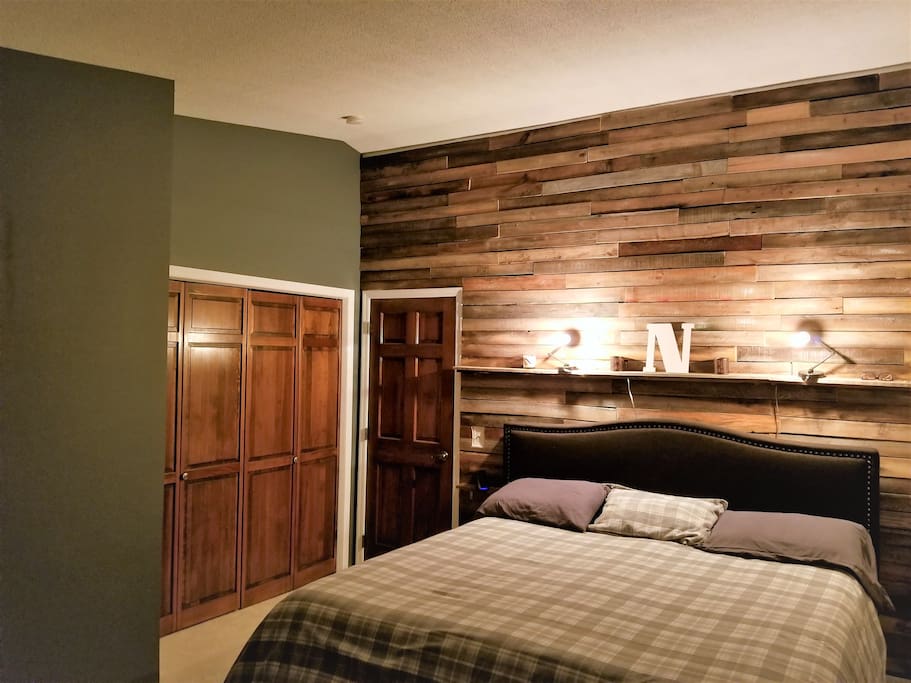 Newly remodeled Master Suite with blackout curtains, King Tempurpedic, and a rustic feel for added comfort.