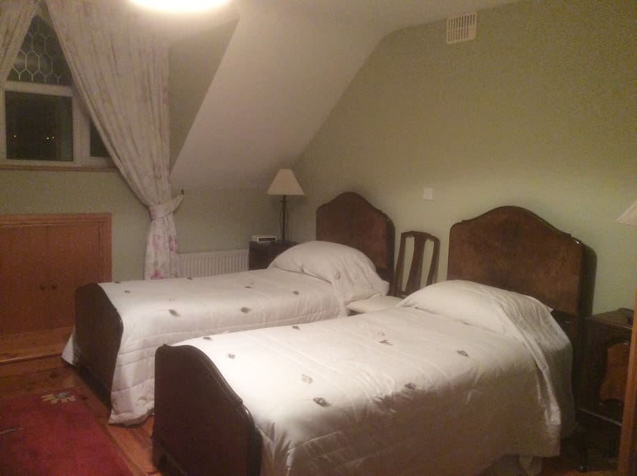 Large spacious room beds can be zipped to make double. There is also third bed this room. Room also has bathroom