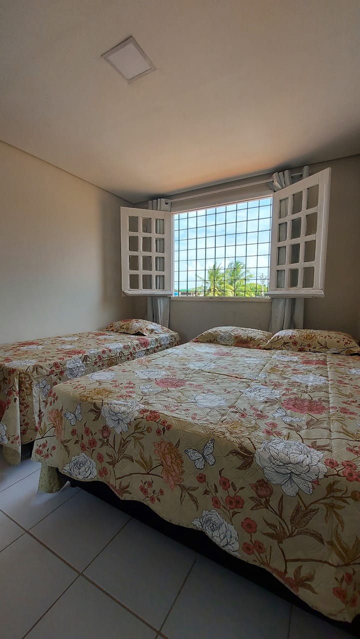 Bedroom 3 - 1 double bed, 1 single bed, dresser, air conditioning and black-out curtain