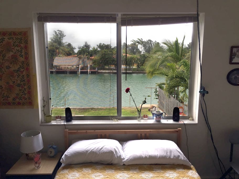Bedroom with a waterfront view