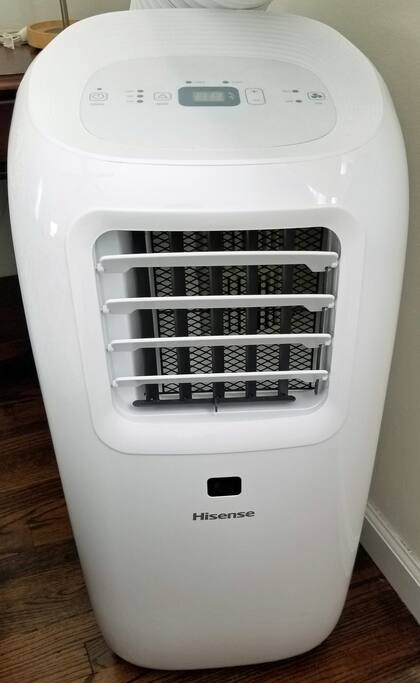 Portable air conditioner located in the bedroom. Please note that this air conditioner will only cool the bedroom and bathroom, NOT the entire apartment. There is NO CENTRAL A/C in the apartment.