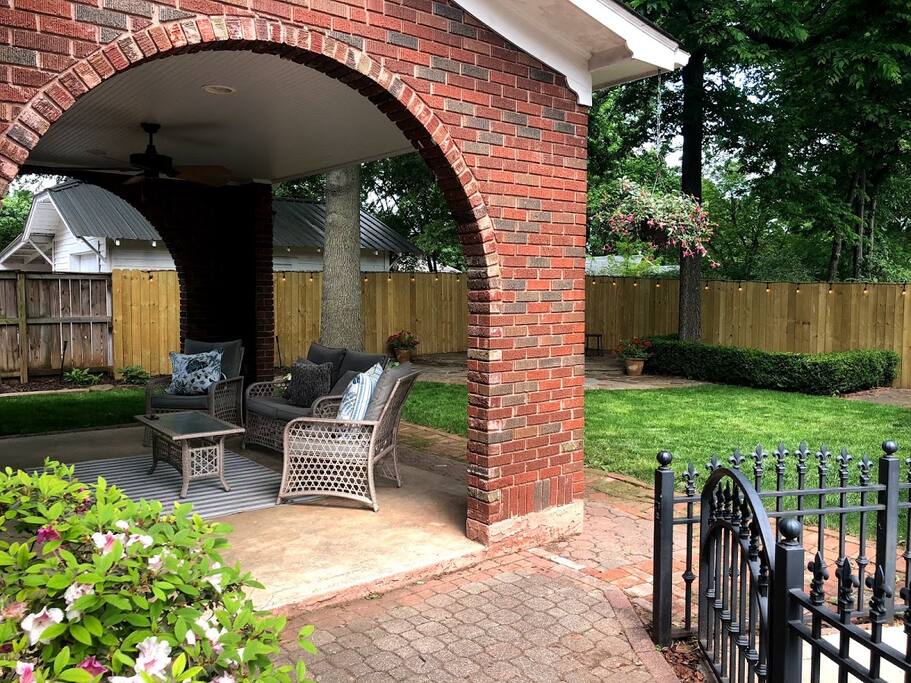 Covered private backyard perfect for hanging out.
