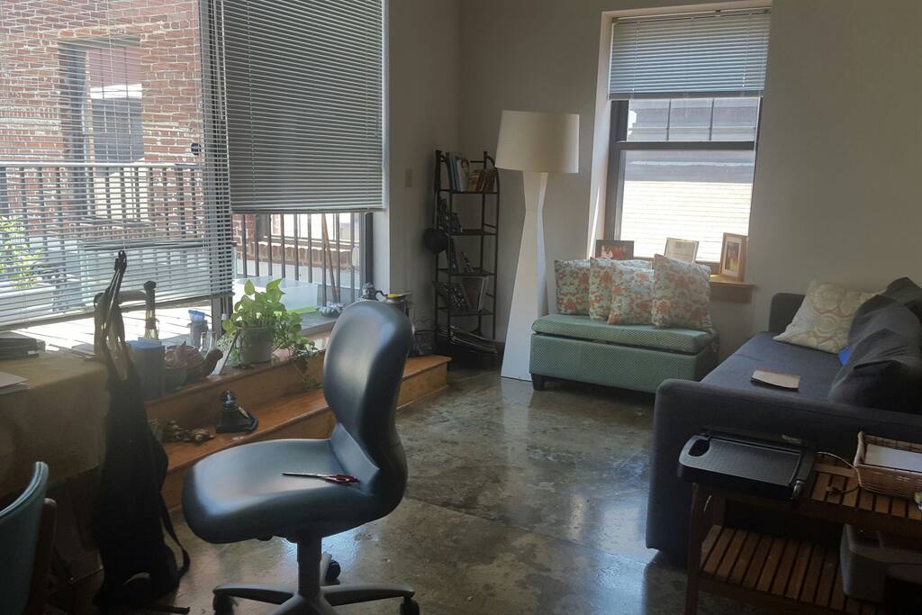 I Am an Artist who works from home. I Move Furniture's Around quite often so placement may differ depending on my mood. My desk is filled with work stuff. Your welcome to hang out with me there if you like.