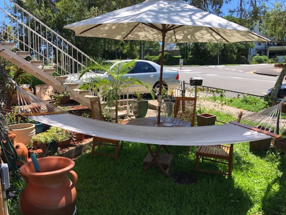 lovely hammock and garden chair and table. perfect place to catch the winter sun and say hi to the neighbours