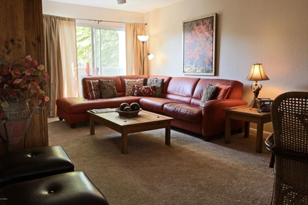 Spacious living room with sofa bed.