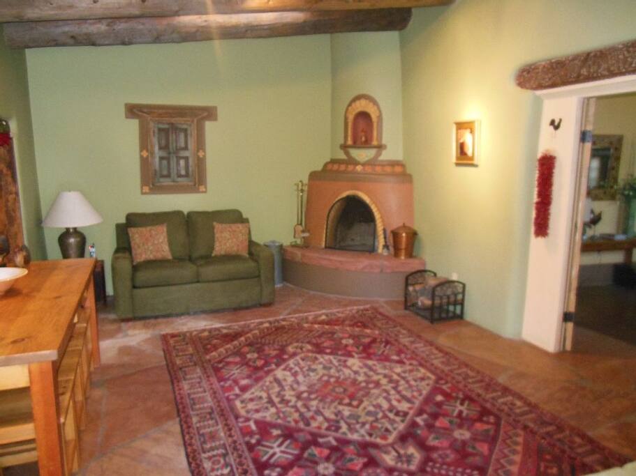 The upstairs living area features a sleeper sofa.