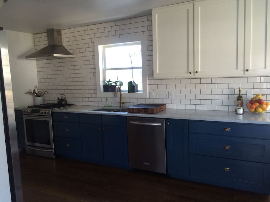 Kitchen with dishwasher, oven, stove, coffee maker