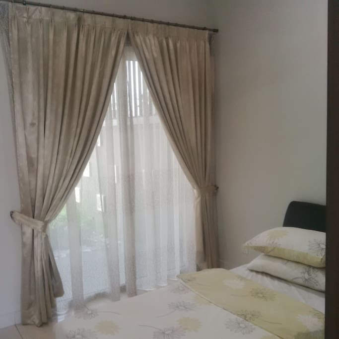 Tastefully decorated with day and night curtains, garden view. The room is shielded from the sun and always cool. The room is kept as a guest room only, and is hardly used. Furniture are still like new.