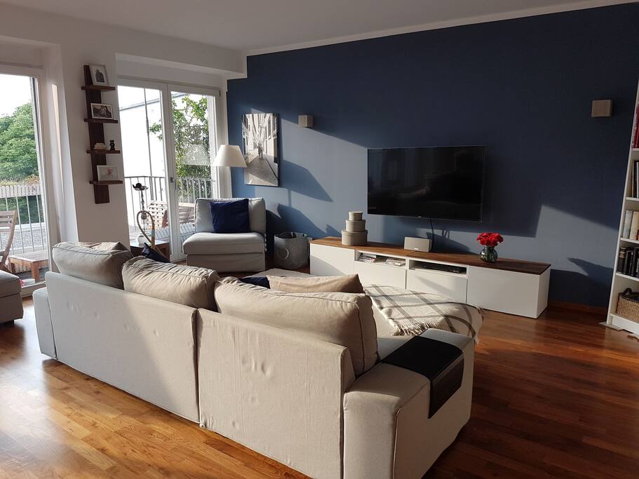 Livingroom with TV and lots of Light