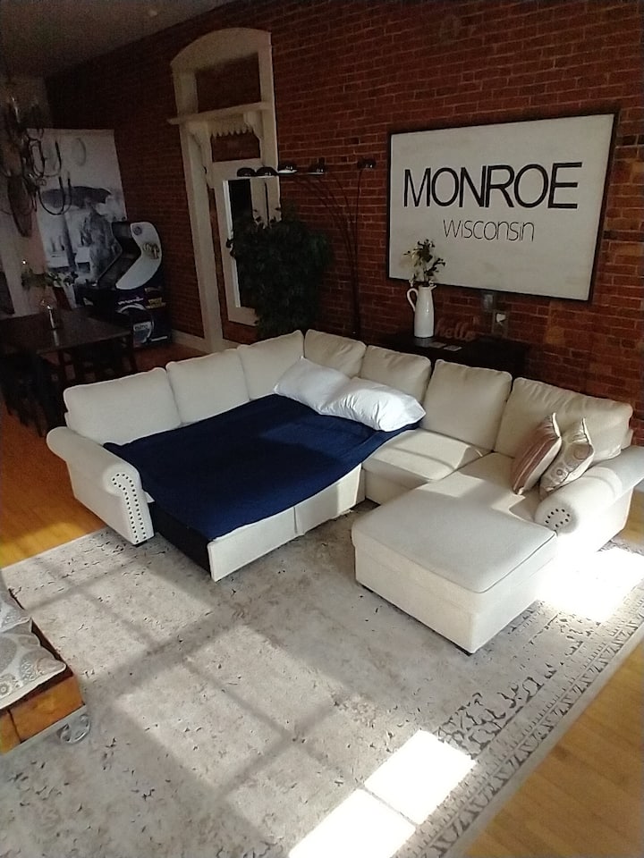 Sofa bed that is located in the front of the penthouse (living room) that sleeps two adults.