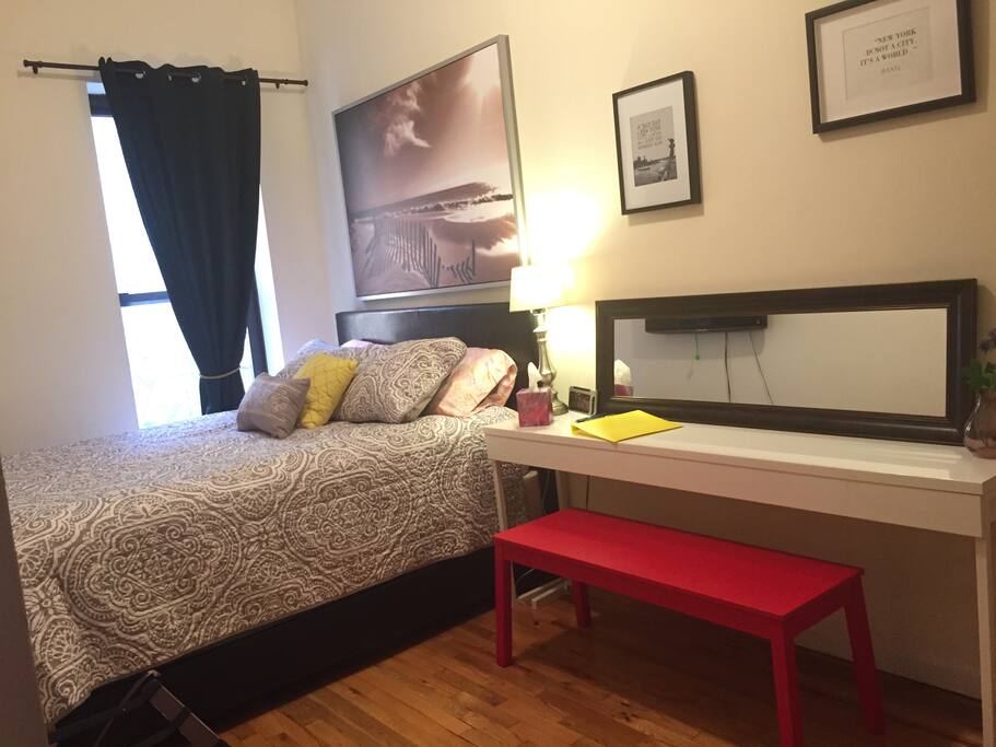 Your room with a large window for lots of natural sunlight. An Air conditioner is installed in the window during the summer months to make sure you have a comfortable and cool stay :)