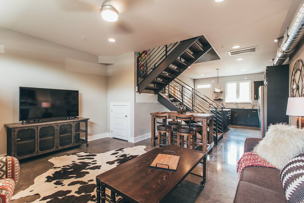 Skyline views and upscale finishes are abound in our modern-meets-industrial property