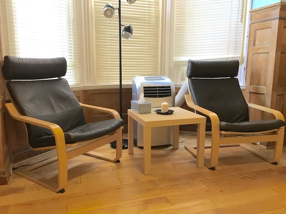 and 2 comfortable leather chairs for relaxation and reading etc.
