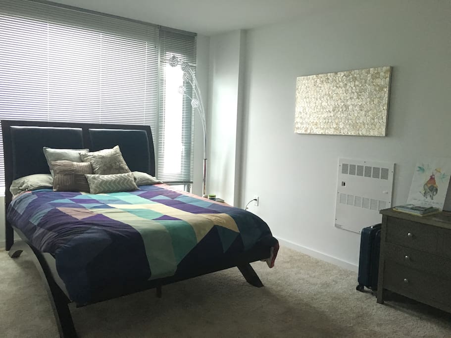 Comfortable queen size bed sleeps 2
