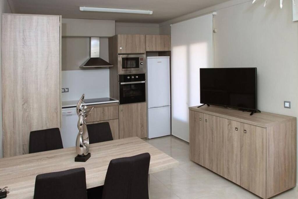 Reconnect with loved ones over a meal in your bright apartment.