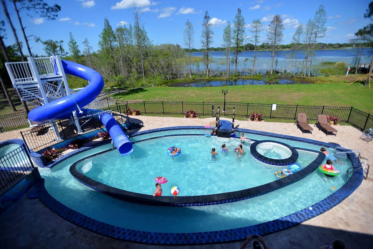The "Go Fish" Pool has a huge waterslide, PLUS a kiddy waterslide, spa, and lazy river!