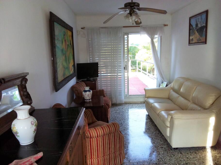 Living comedor con terraza exterior y vista al parque