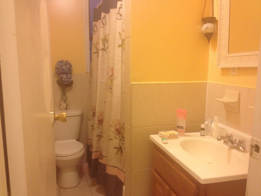 bathroom is next to "your" room so no need to pass through any rooms to get to it to and from your room...