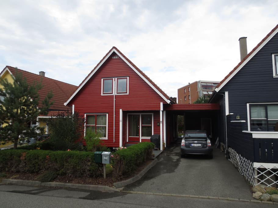 House in front with carport