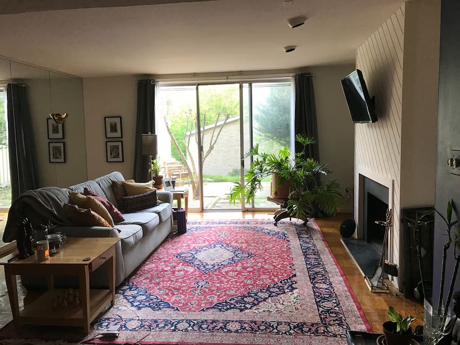 Sunny living area with TV
