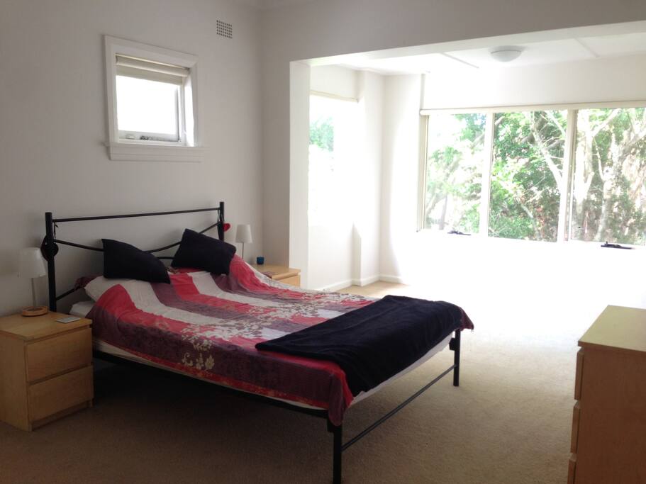 Large main bedroom with leafy outlook