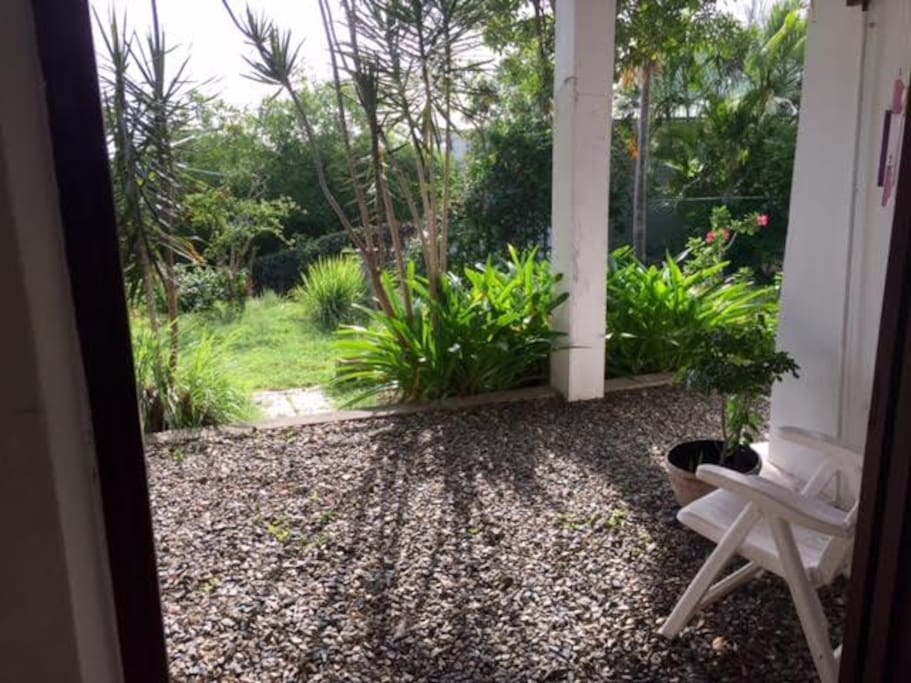 Garden view. Almond Grove is famous for its sugar birds, tropical flowers, and lush green spaces
