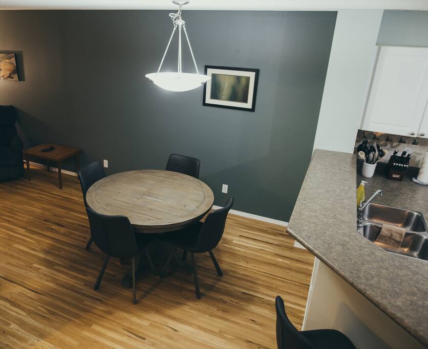 New dining room table, opening to the living room as well as to the kitchen