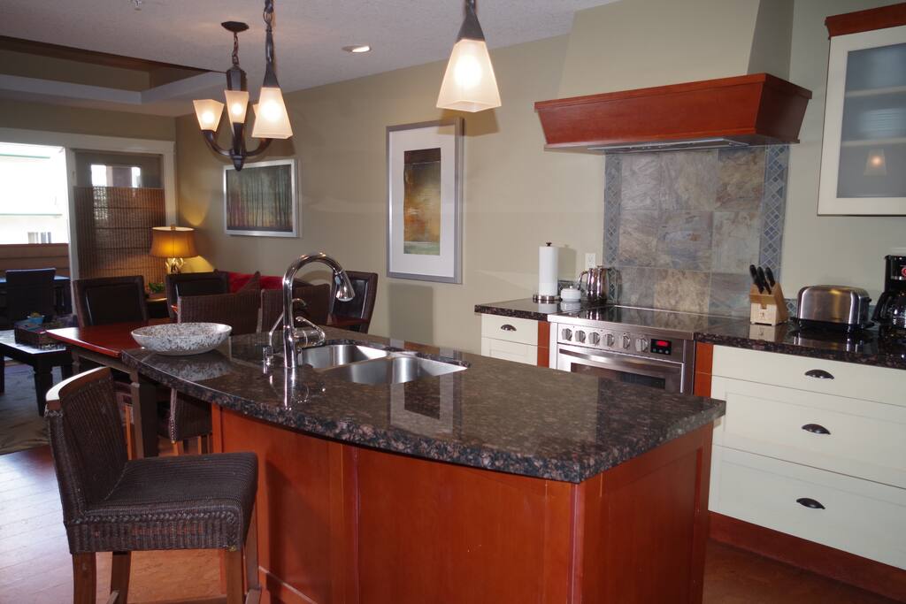 Open concept floor plan of kitchen, dining room, and living room.