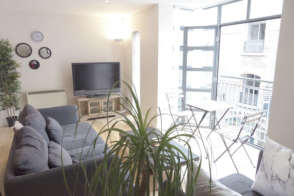 Modern Bright Living Room with internal balcony.