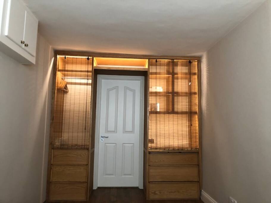 Closet Space with entrance to bathroom