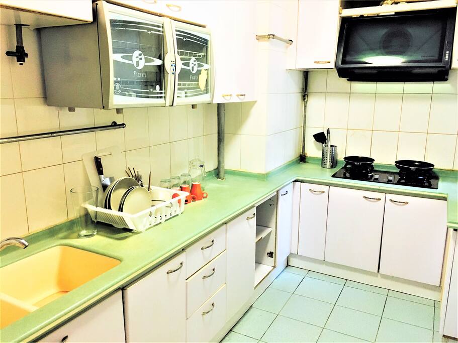 kitchen with full utensils